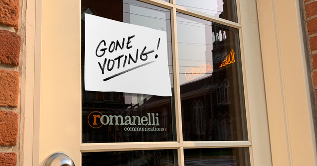 GONE VOTING! sign on the front door of Romanelli Communications